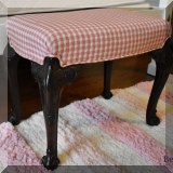 F34. Vanity stool with pink gingham upholstery. 